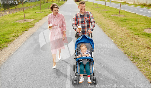 Image of family with baby in stroller and coffee in city