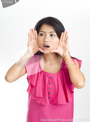 Image of young asian woman framed face