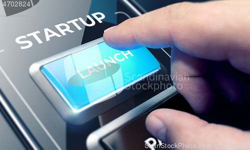 Image of Startup - Man Pushing Button on Futuristic Interface.