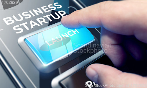 Image of Business Startup - Man Pushing Button on Futuristic Interface.