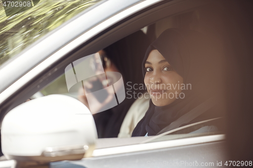 Image of Arabic Woman Couple Traveling By Car