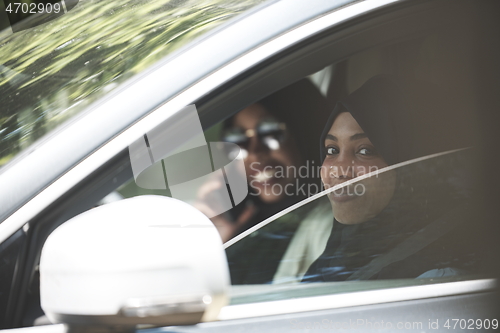 Image of Arabic Woman Couple Traveling By Car