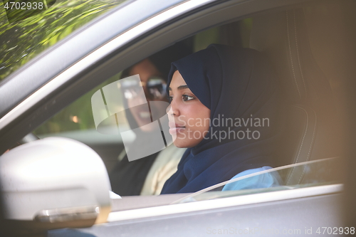 Image of Arabic Woman Couple Traveling By Car