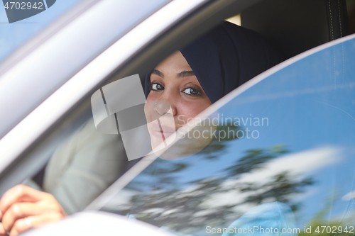 Image of Arabic Woman Traveling By Car