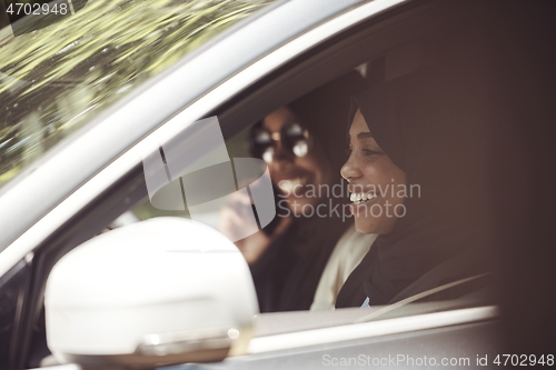 Image of Arabic Woman Couple Traveling By Car