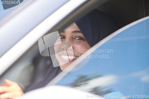 Image of Arabic Woman Traveling By Car