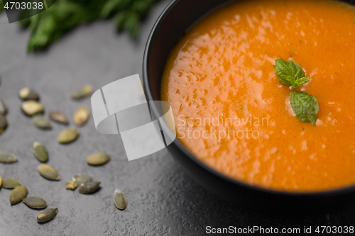 Image of close up of vegetable pumpkin cream soup in bowl