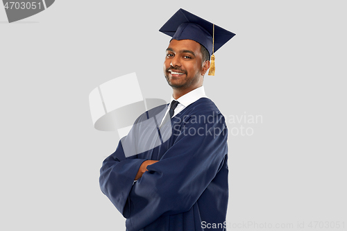 Image of graduate student in mortar board and bachelor gown