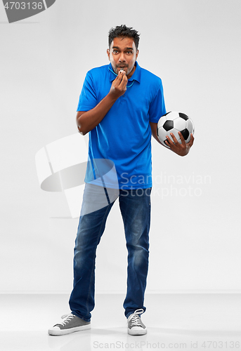 Image of indian football coach with soccer ball and whistle