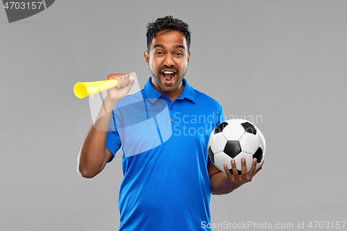 Image of male football fan with soccer ball and vuvuzela