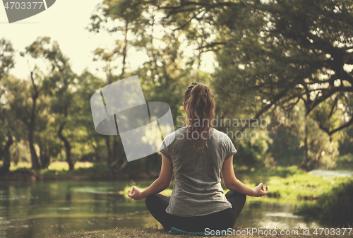 Image of woman meditating and doing yoga exercise