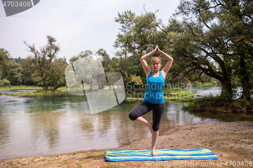 Image of woman meditating and doing yoga exercise