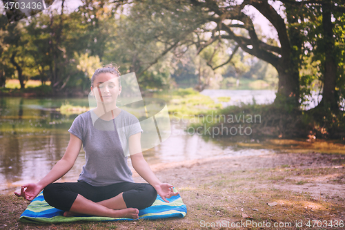 Image of woman meditating and doing yoga exercise