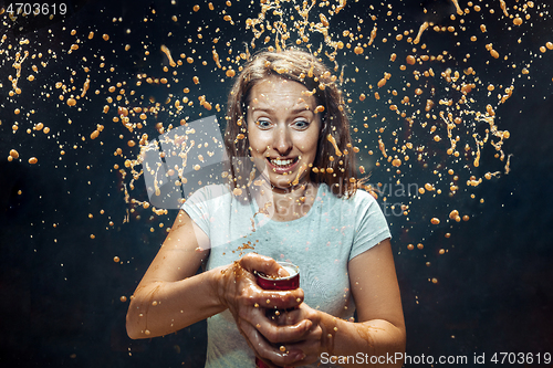 Image of Woman drinking a cola