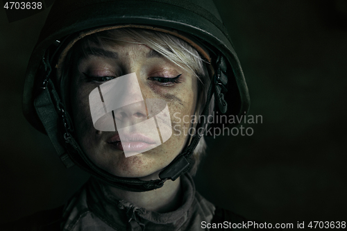 Image of Portrait of young female soldier