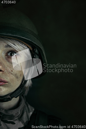 Image of Portrait of young female soldier