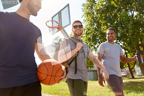 Image of group of male friends going to play basketball