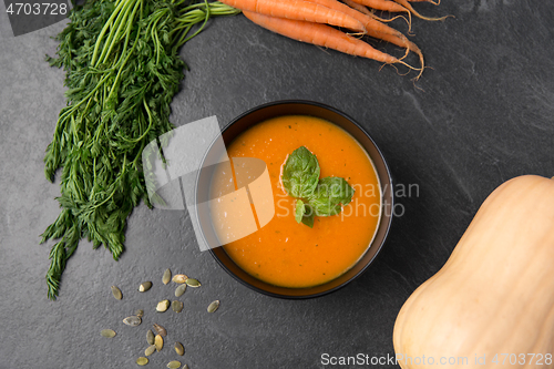 Image of close up of pumpkin cream soup and vegetables