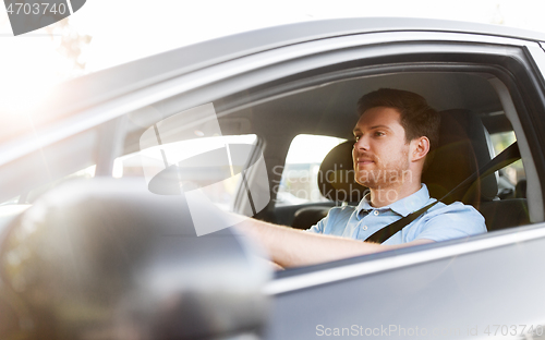 Image of man or driver driving car in summer