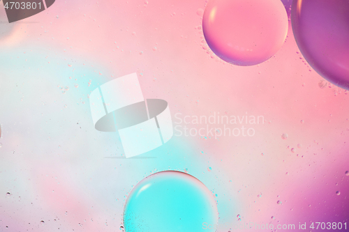 Image of Defocused pastel colored abstract background picture made with oil, water and soap