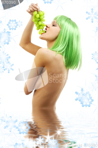 Image of green hair girl with a bunch of grapes in water