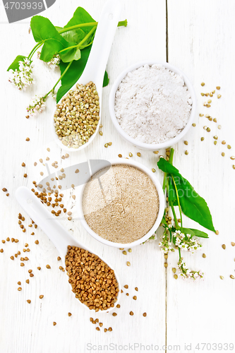 Image of Flour buckwheat brown and green in bowls on light board top