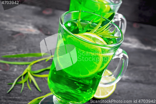 Image of Lemonade Tarragon in two goblets on dark wooden board