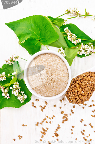 Image of Flour buckwheat brown in bowl on light board top