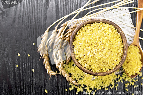 Image of Bulgur in bowl on board top