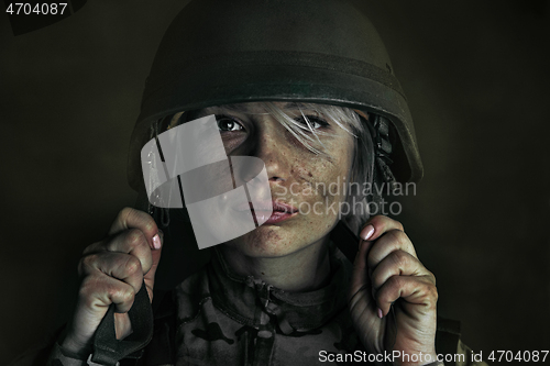 Image of Portrait of young female soldier