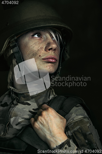 Image of Portrait of young female soldier