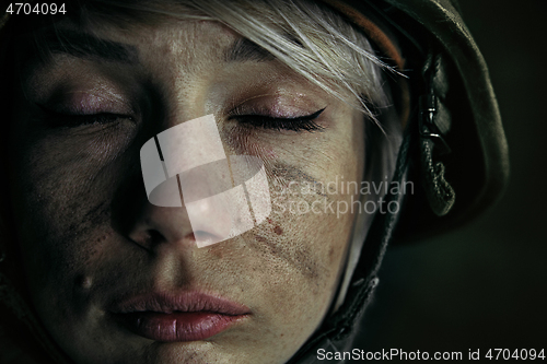 Image of Portrait of young female soldier