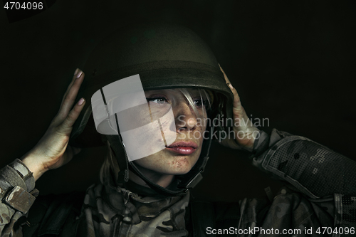 Image of Portrait of young female soldier