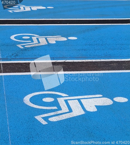 Image of 3 Logos for disabled on supermarket parking