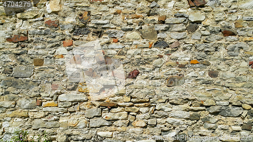 Image of Texture of ancient wall with stones, cobblestones and bricks