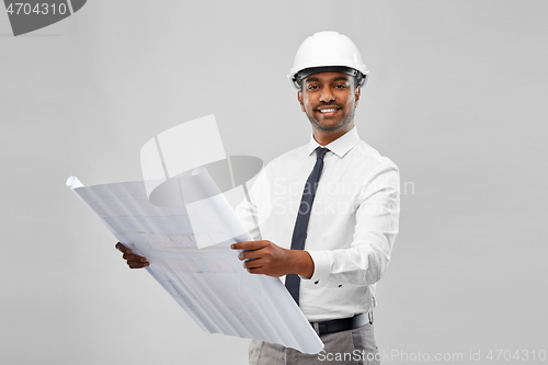 Image of indian male architect in helmet with blueprint