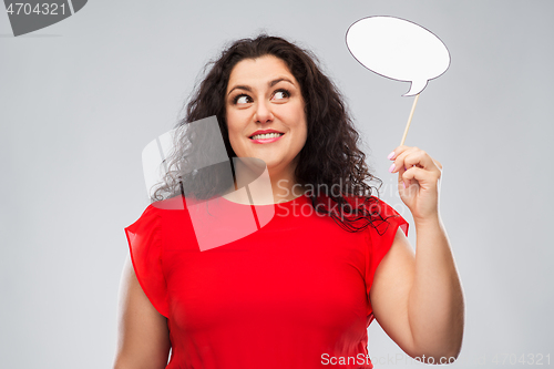 Image of happy woman in red dress holding speech bubble