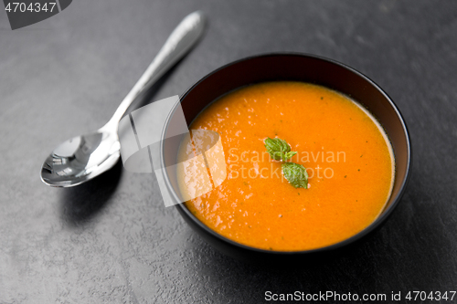 Image of close up of vegetable pumpkin cream soup in bowl