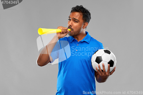 Image of male football fan with soccer ball and vuvuzela