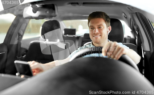 Image of man or driver driving car and using gps navigator