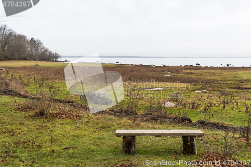 Image of Coastal resting place with a bench