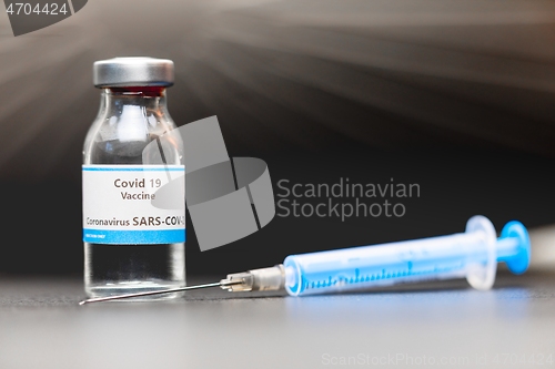 Image of Vaccine for virus in small bottles