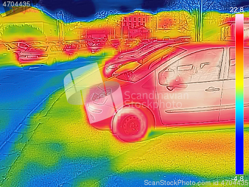 Image of Thermal image showing parked cars at town parking a lot of