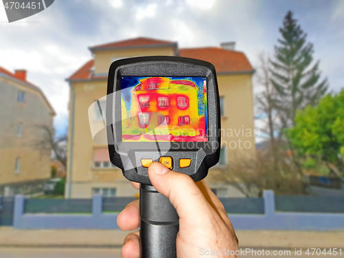 Image of Recording Heat Loss at the House With Infrared Thermal Camera