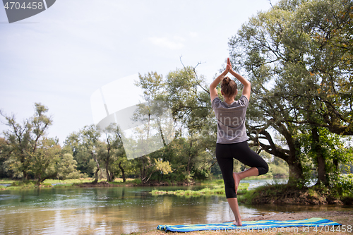 Image of woman meditating and doing yoga exercise