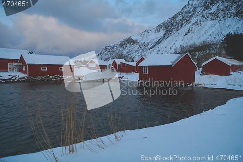 Image of Traditional Norwegian fisherman\'s cabins and boats