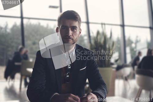 Image of business man portrait at modern office