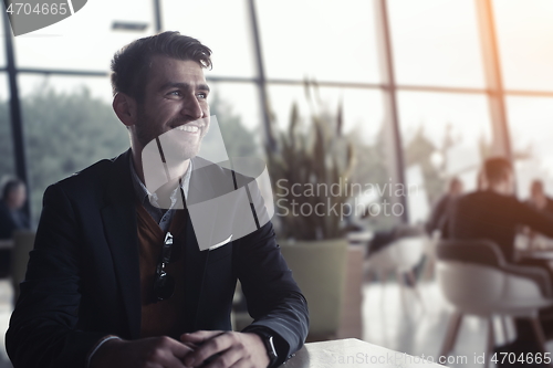 Image of business man portrait at modern office