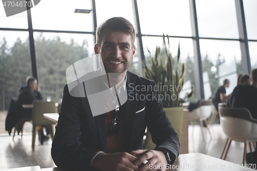 Image of business man portrait at modern office