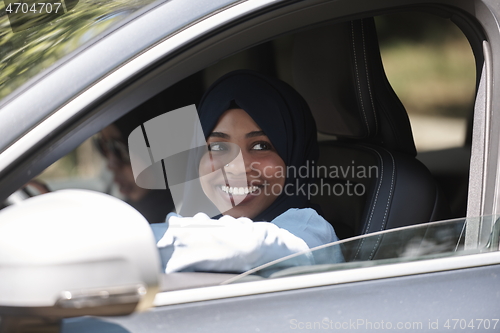 Image of Arabic Woman Couple Traveling By Car